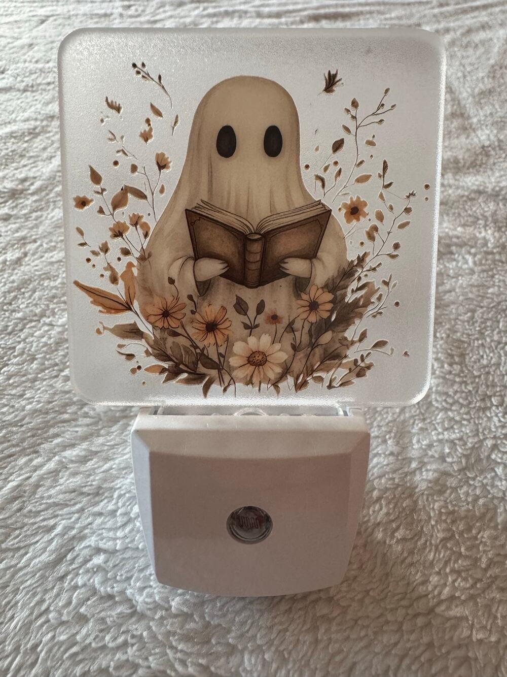 Ghost reading book nightlight
